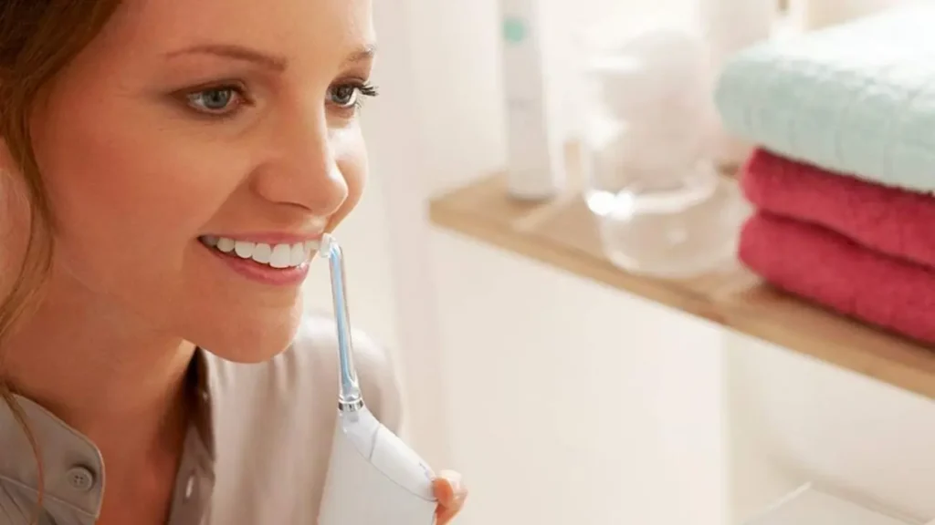 Find out if you should use the dental irrigator before or after brushing