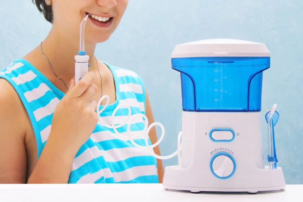 How can the dental irrigator help you remove tartar from your mouth?