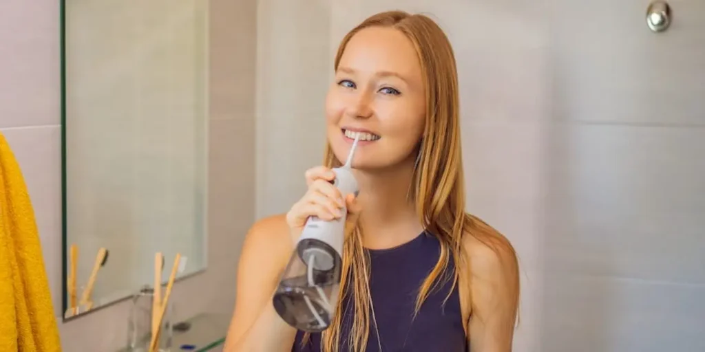 Los beneficios de la limpieza dientes agua a presion